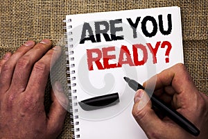 Handwriting text writing Are You Ready Question. Concept meaning Be Prepared Motivated Warned Readiness Aware written by Man Holdi