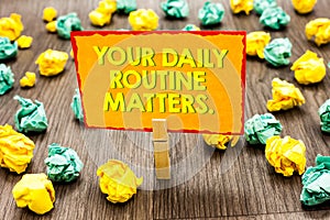 Handwriting text Your Daily Routine Matters. Concept meaning Have good habits to live a healthy life Paperclip hold written yellow