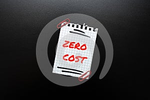Writing displaying text Zero Cost. Concept meaning business decision that does not entail any expense to execute photo