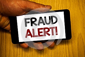 Handwriting text writing Fraud Alert Motivational Call. Concept meaning Security Message Fraudulent activity suspected