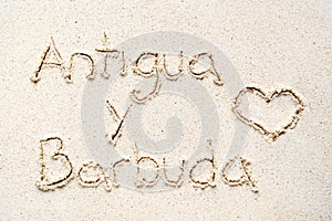 Handwriting words `Antigua y barbuda` photo