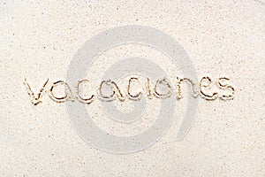 Handwriting words `Vacaciones` in spanish photo