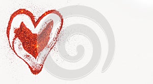 Handwritten heart shapes on red glitter