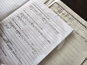 Handwritten Javanese script written by students in school.