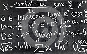 Handwritten mathematical formulas on blackboard written. photo