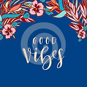 Handwritten phrase Good Vibes and hand-drawn tropical plants on dark blue background