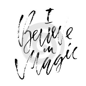 Handwritten phrase. I believe in magic. Typographical banner. Calligraphy poster. Modern dry brush lettering.