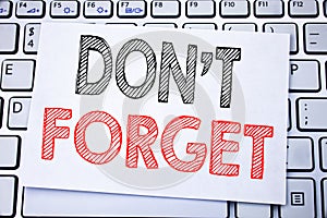 Handwritten text caption showing Do Not Forget. Business concept writing for Don t memory Remider written on sticky note paper on