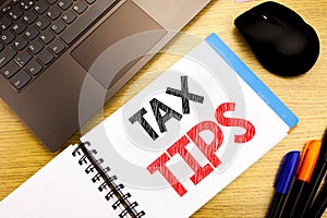 Handwritten text caption showing Tax Tips. Business concept writing for Taxpayer Assistance Refund Reimbursement written on notepa