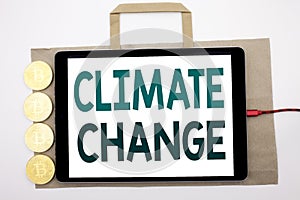 Handwritten text showing Climate Change. Business concept writing for Global Planet Warming Written on shopping bag and tablet wit