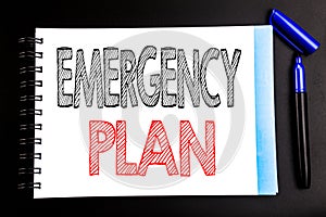 Handwritten text showing Emergency Plan. Business concept writing for Disaster Protection Written on notepad note paper, black bac