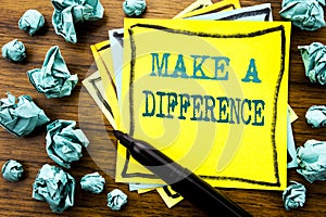 Handwritten text showing Make A Difference. Business concept for Motivation Success Written on sticky note paper, wooden backgroun