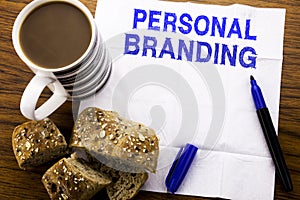 Handwritten text showing Personal Branding. Business concept for Brand Building written on tissue paper on the wooden background w