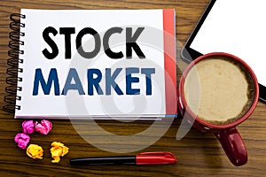 Handwritten text showing Stock Market. Business concept writing Equity Share Exchange Written on notepad note paper, old black woo