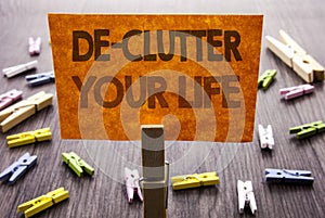 Handwritten text sign showing De-Clutter Your Life. Business concept for Free Less Chaos Fresh Clean Routine written on sticky Not