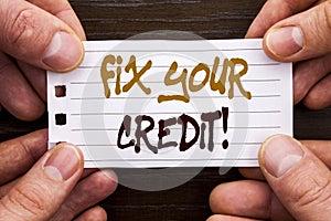 Handwritten text sign showing Fix Your Credit. Business concept for Bad Score Rating Avice Fix Improvement Repair written on Stick