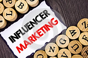 Handwritten text sign showing Influancer Marketing. Business concept for Social Media Online Influence Strategy written on White S