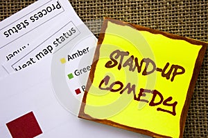 Handwritten text sign showing Stand Up Comedy. Business concept for Entertainment Club Fun Show Comedian Night written on Sticky N