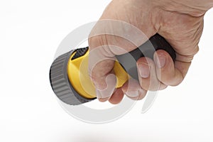 Handy LED torch in hand
