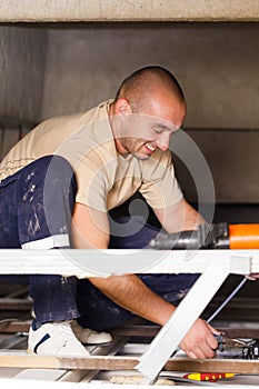 Handy Man Working With Cables