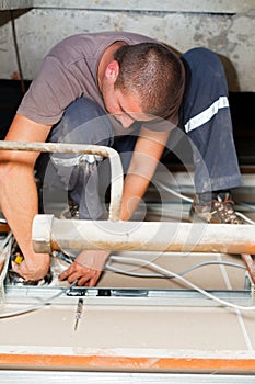 Handy Man Working With Cables