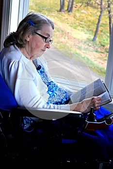 Handicapped Woman Reading Bible