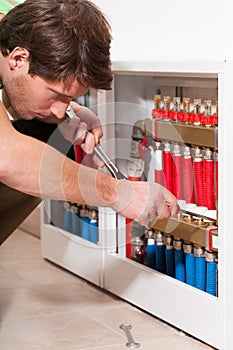 Handyman in boiler room