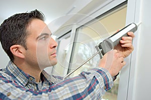 handyman caulking window