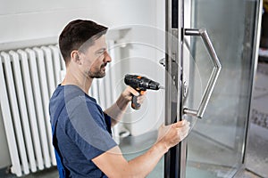 Handyman Fitting A New Door