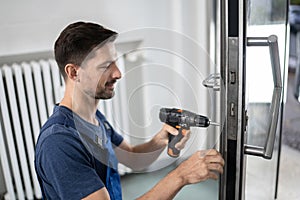 Handyman Fitting A New Door