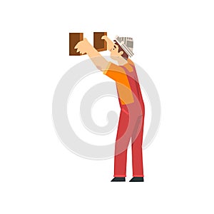 Handyman Fixing Shelf to Wall, Male Construction Worker Character in Paper Cap Vector Illustration