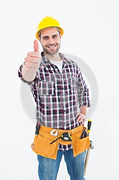 Handyman gesturing thumbs up