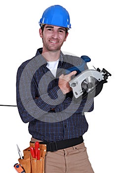 Handyman holding a circular saw.