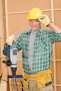 Handyman home improvement working with jackhammer