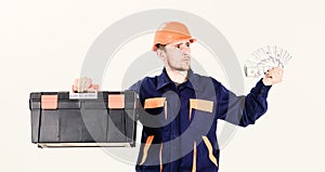 Handyman with pensive face in hard hat on white background.