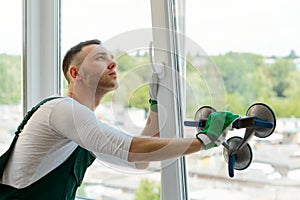 Handyman is repairing a window