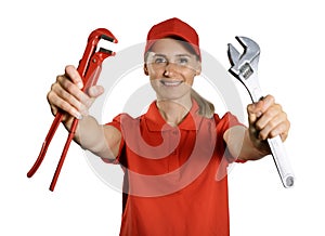 Handyman services - smiling handywoman in red uniform with repair tools in hands isolated on white background