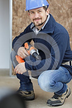 handyman using cordless drill