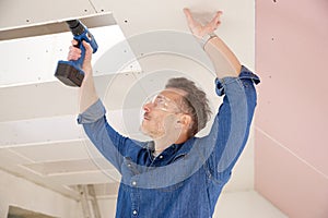 Handyman working with drill