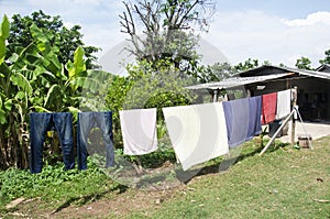 Hang clothes on the clothesline after washing for dry clothes in