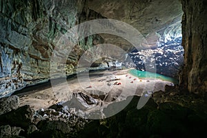 Hang En Cave - Tourists Camping Inside Large Cave in Vietnam. Cave with a beach