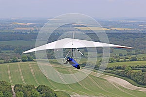 Hang Glider flying at Combe Gibbet, England photo