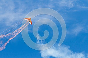 Hang glider flying through the sky