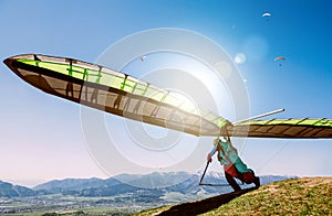 Hang glider launch from top of hill