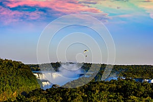 Hang Glider over Iguasu Falls at sunset