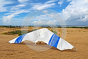 Hang glider on a sand dune at Jockeys Ridge State Park, Nags Head, NC photo