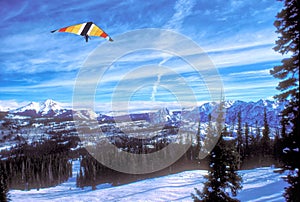 A Hang-Glider Soars Over the San Juan Mountains of Colorado