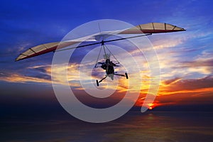 Hang glider in the sunset