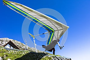 Hang glider take off in Austrian Alps.