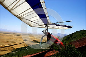 Hang-glider taking off